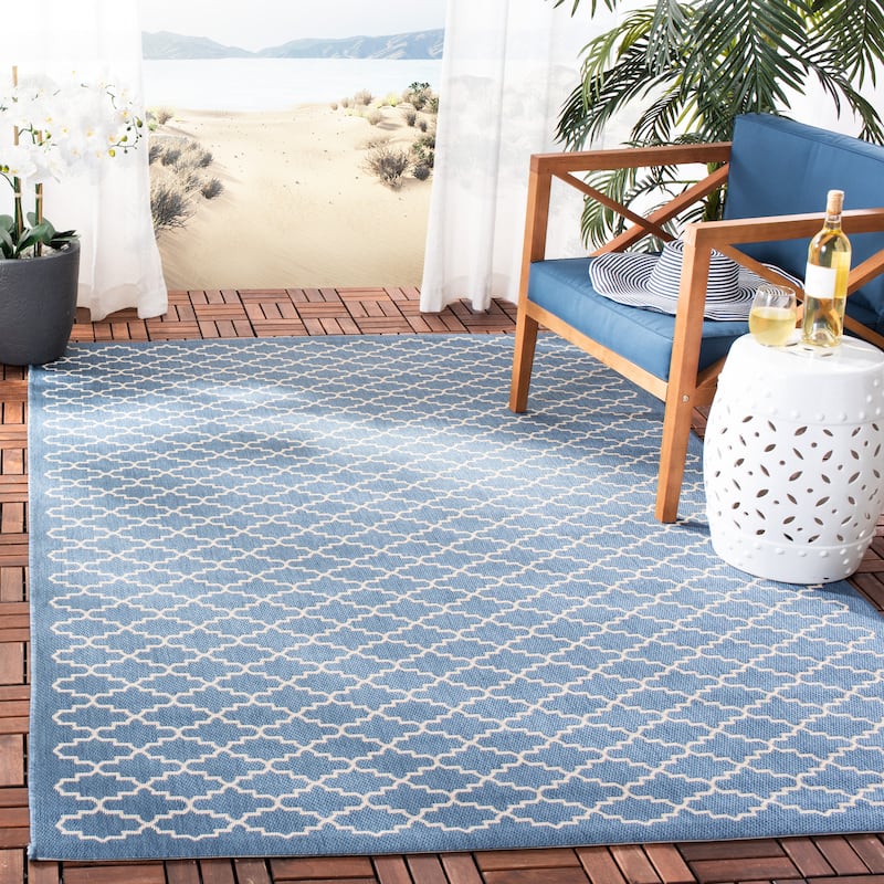 SAFAVIEH Courtyard Gerdi Indoor/ Outdoor Patio Backyard Rug - 4' x 5'7" - Blue/Beige
