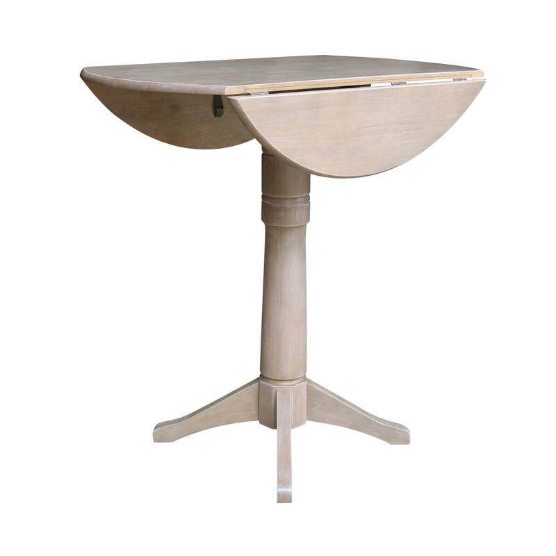 42 in. Round Top Dual Drop Leaf Pedestal Dining Table