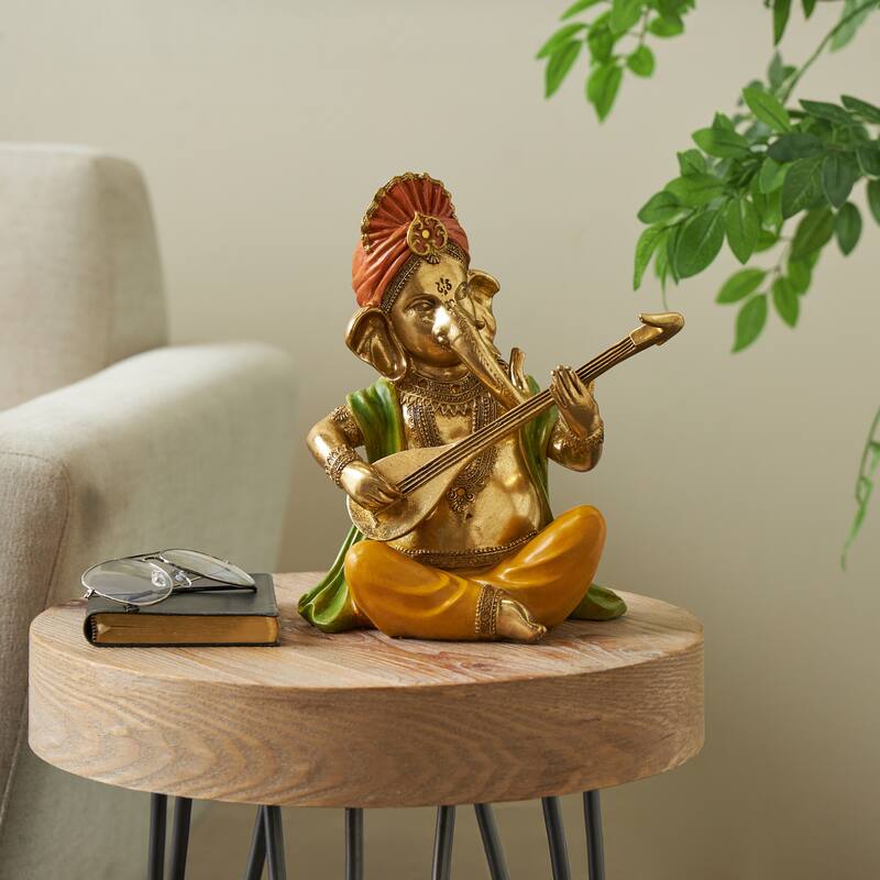 Gold Resin Musician Ganesh Decorative Sculpture with Green, Yellow, and Red Accents - Gold