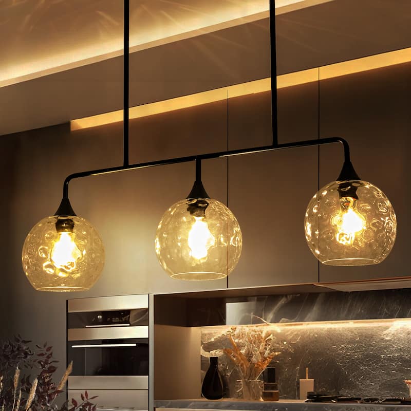 3-Light Modern Black/Brushed Gold Linear Chandelier for Kitchen Island with Clear Textured Glass Globe Shades
