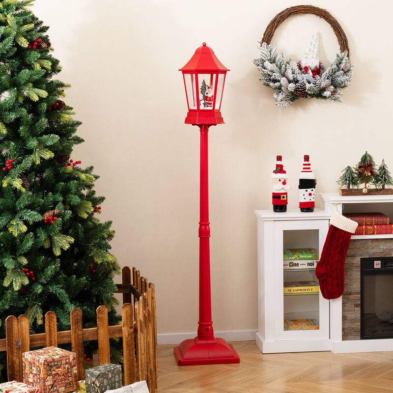 5.3 Feet Red Musical Christmas Street Lamp with LED Lights, Snow Scene, Santa, and 8 Tunes - 12.5" x 12.5" x 64"