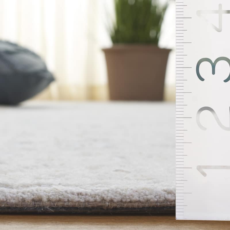 SAFAVIEH Handmade Ebony Marcijona Modern Contemporary Wool Rug