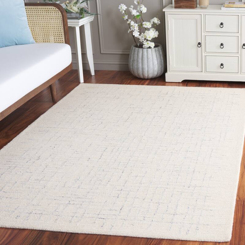 SAFAVIEH Handmade Ebony Bodhild Modern & Contemporary Wool Rug - 5' x 8' - Ivory/Navy