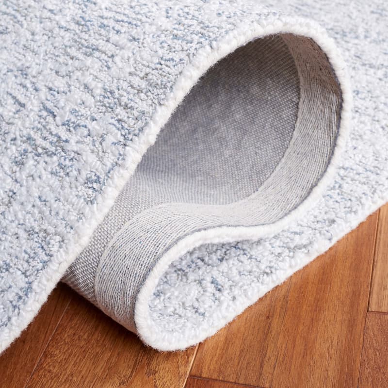 SAFAVIEH Handmade Ebony Fanita Modern Rug