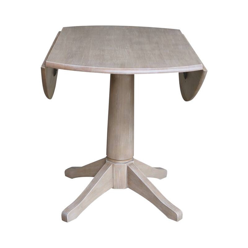 42 in. Round Top Dual Drop Leaf Pedestal Dining Table