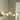 Thesis Stockholm 50-inch 8-light Champagne Gold Linear Chandelier with Opal Glass Shades