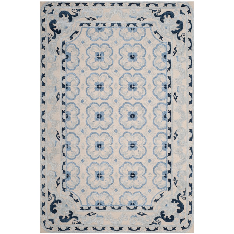 SAFAVIEH Handmade Bella Nursel Modern Floral Wool Rug - 6' x 9' - Ivory/Blue