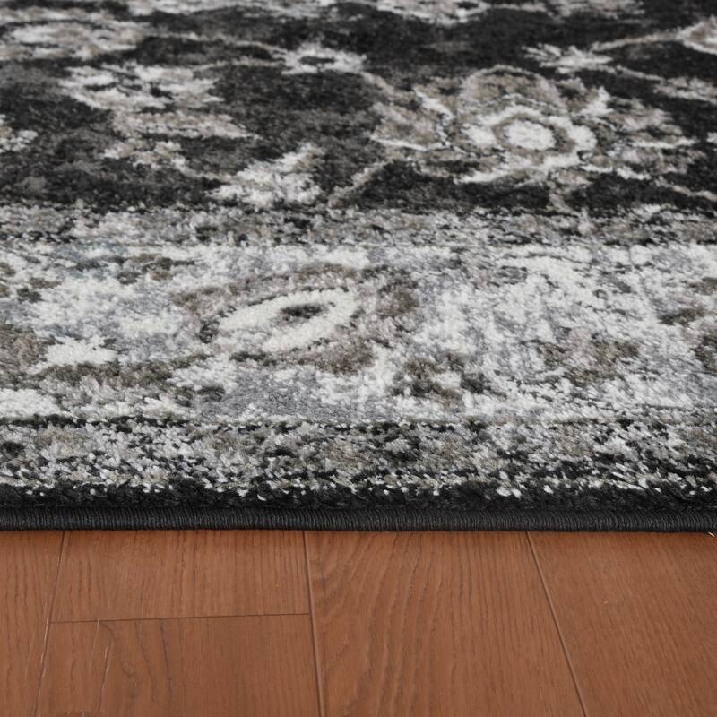 Aurelia Jiru Black Bordered Area Rug