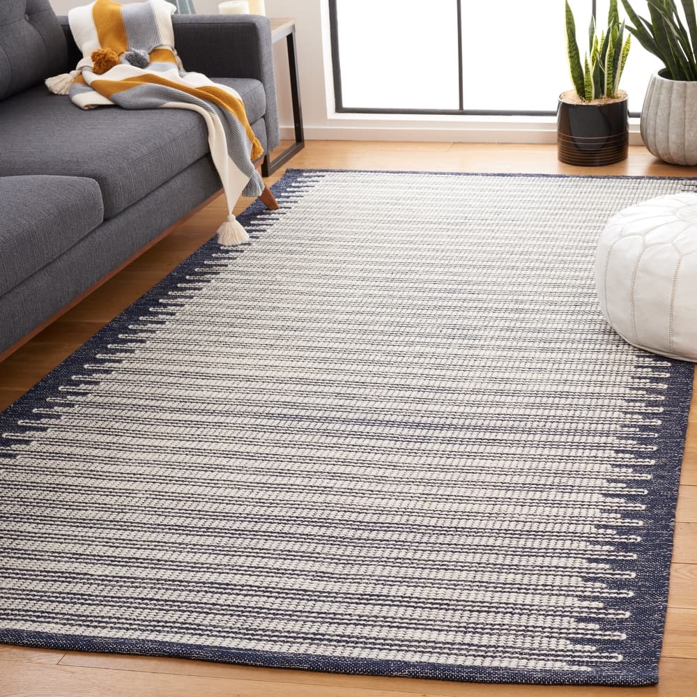 SAFAVIEH Handmade Ebony Cheol Modern Wool Rug