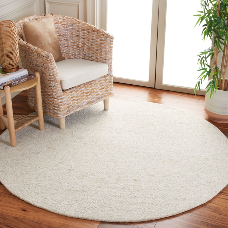 SAFAVIEH Handmade Ebony Laoise Modern Wool Rug - 6' Round - Gold/Ivory