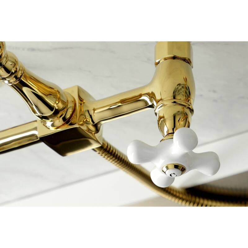 Kingston Brass Heritage Wall Mount Bridge Kitchen Faucet with Brass Sprayer