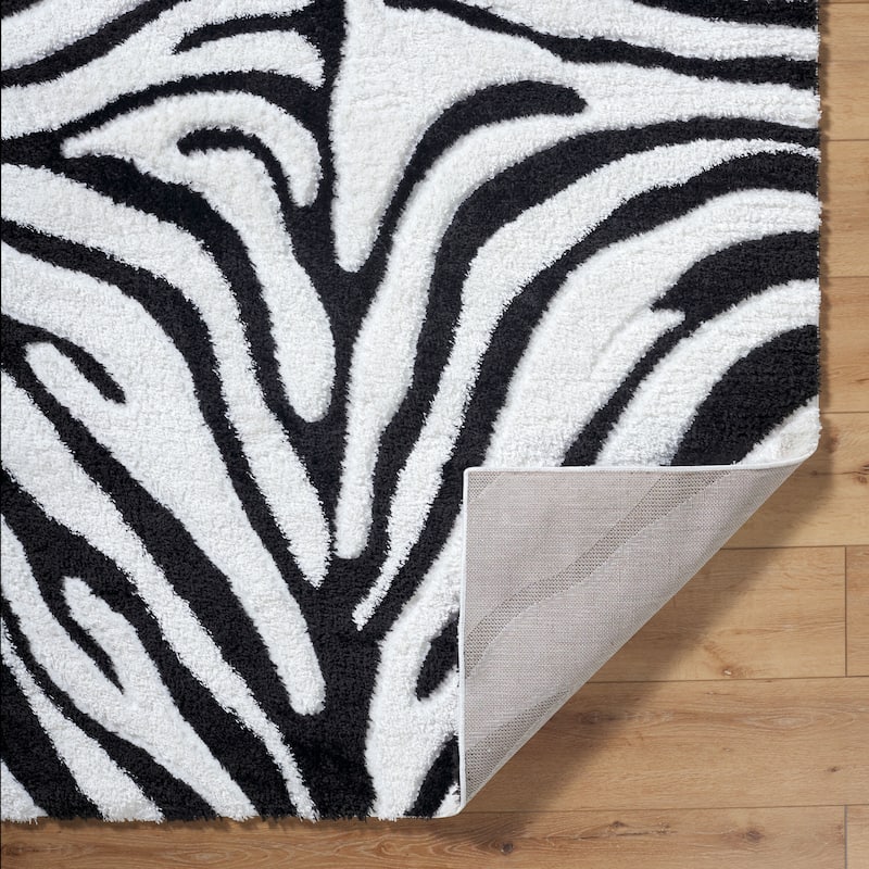 Livabliss Nomadic Animal Print Plush Area Rug