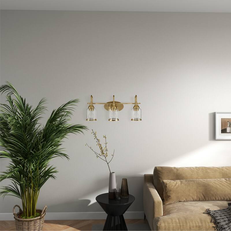 Livex Brushed Gold Triple Vanity Light with Clear Glass