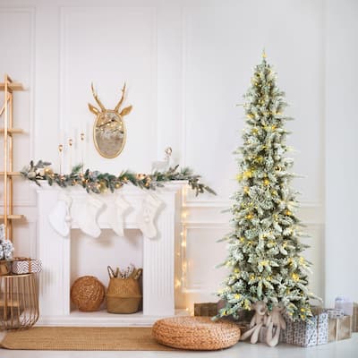 Fraser Hill Farm 9-Ft. Slim Mountain Pine Flocked Christmas Tree with Warm White LED Lights