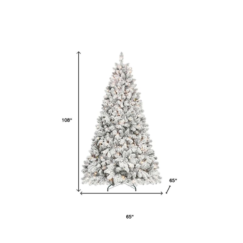 HomeRoots 9' Green And White Pre Lit Full Flocked Christmas Tree With Decorations - 65.00 in. x 108.00 in. x 65.00 in.