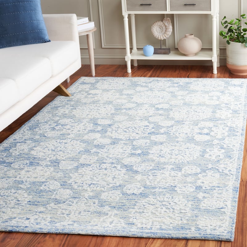 SAFAVIEH Handmade Ebony Muireall Modern Wool Rug - 6' x 9' - Ivory/Blue
