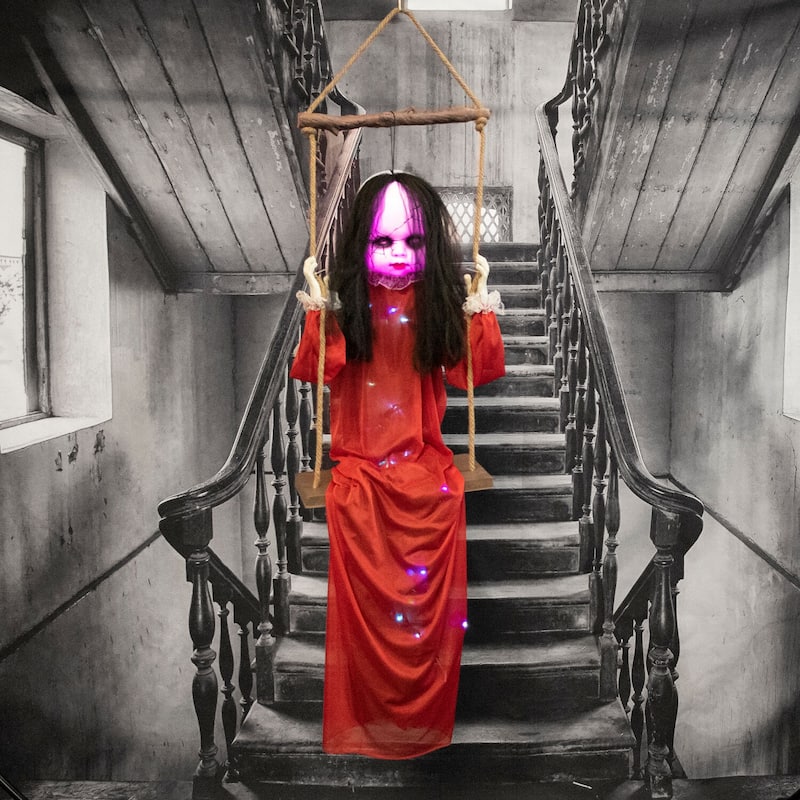 Haunted Hill Farm Giggles the Giggling Zombie Girl on a Swing with Colorful Light-Up Body and Eyes for Halloween Decoration