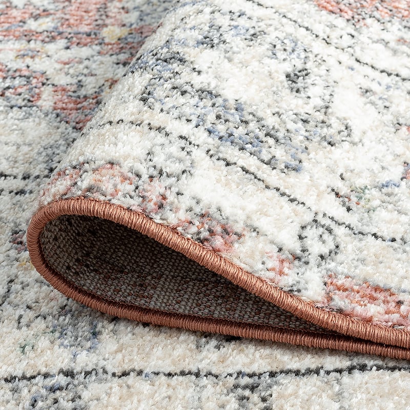 Addalyn Oriental Border Area Rug