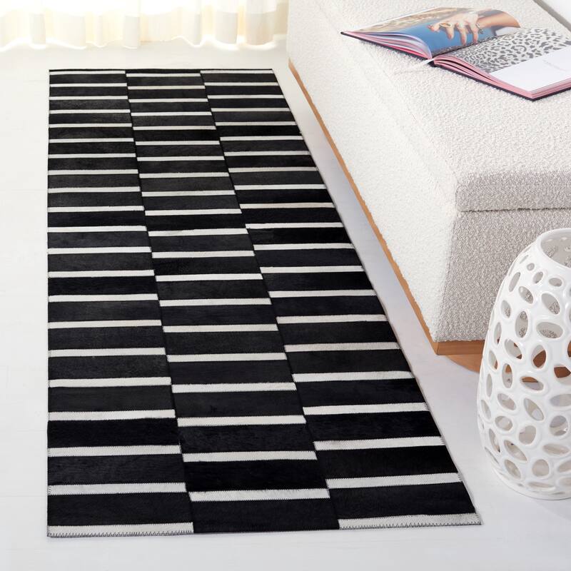 SAFAVIEH Handmade Studio Leather Brande Mid-Century Modern Rug