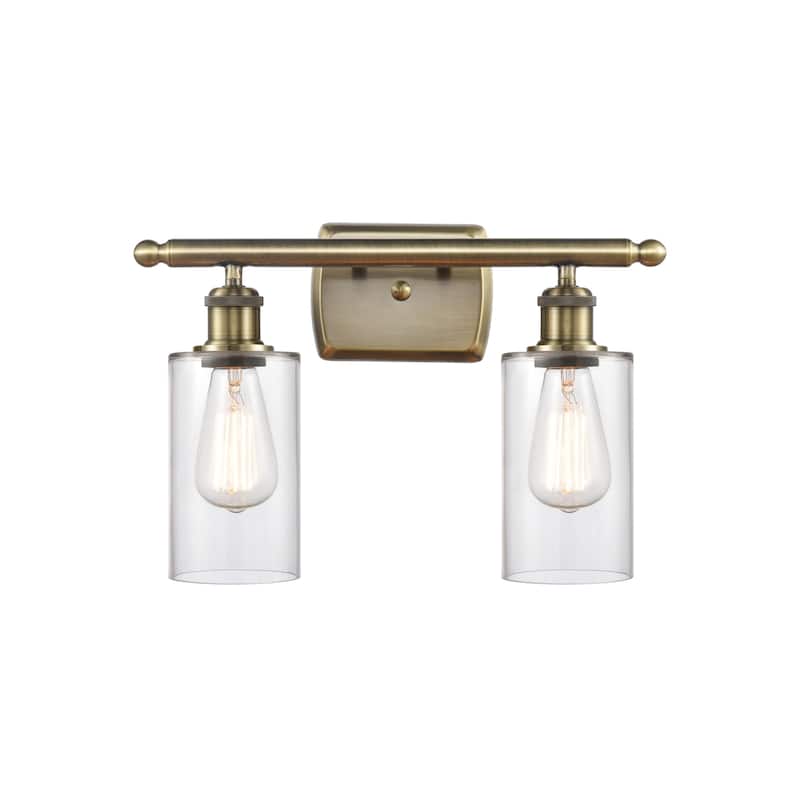 Innovations Lighting 516-2W-12-16 Clymer Vanity Clymer 2 Light 16" - Clear / Antique Brass