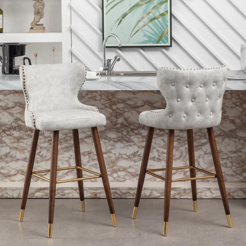 Roundhill Furniture Nevis Mid-century Modern Faux Leather Tufted Nailhead Trim Barstool Set of 2