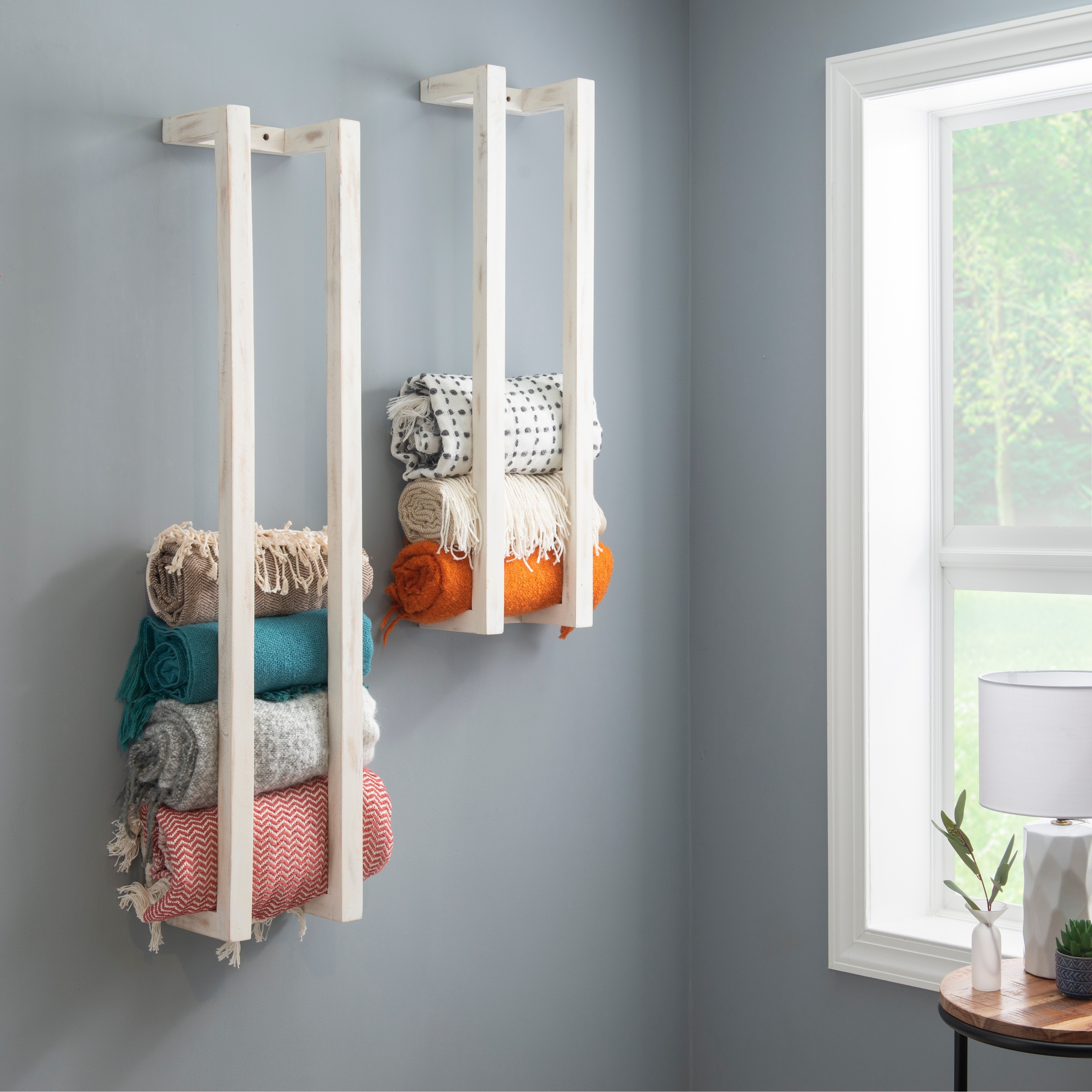 Wall mounted blanket holder clearance