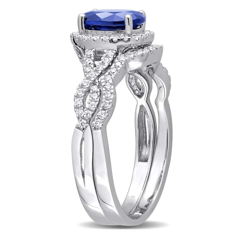 Miadora 3 1/6CT TGW Oval-Cut Blue And White Cubic Zirconia Halo Entwined Ring Set In Sterling Silver