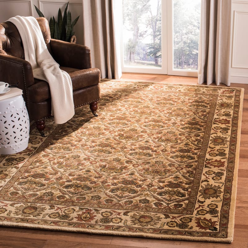 SAFAVIEH Handmade Antiquity Smiljka Traditional Oriental Wool Rug - 8'3" x 11' - Gold
