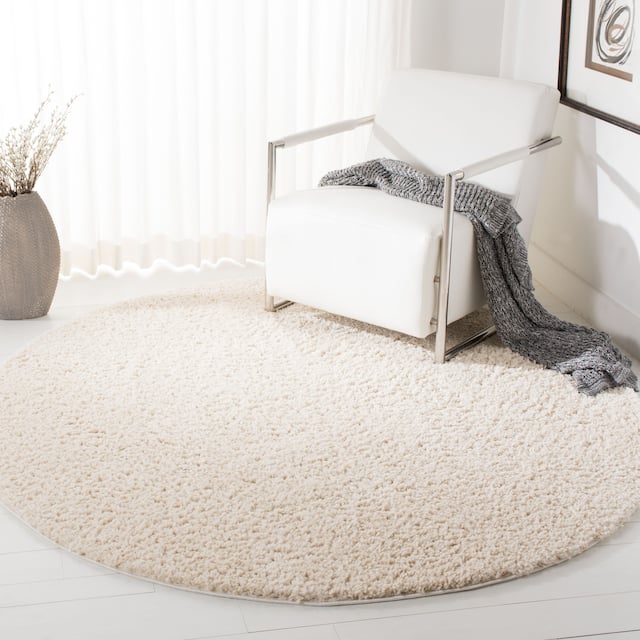 SAFAVIEH August Shag Solid 1.2-inch Thick Area Rug - 6'7" x 6'7" Round - Ivory