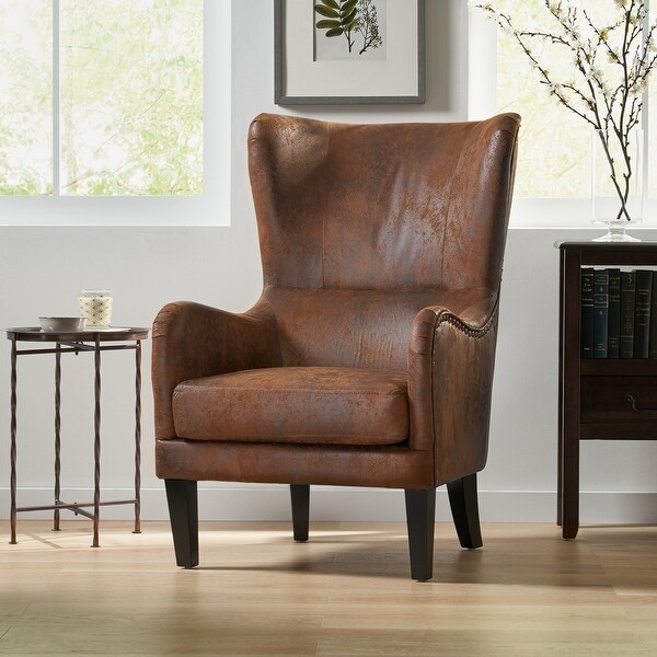 Leather wingback chair sales
