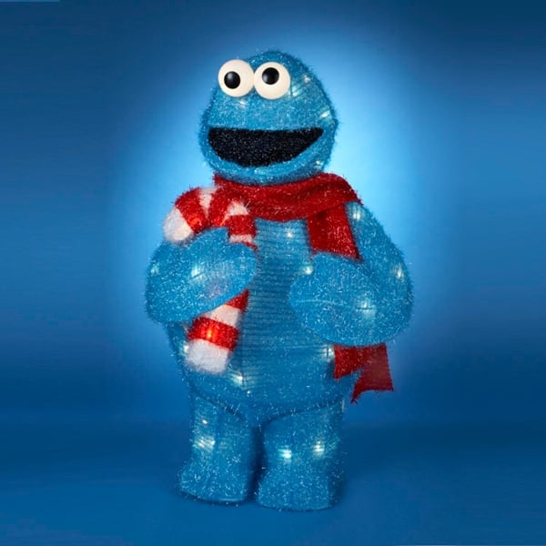 https://ak1.ostkcdn.com/images/products/is/images/direct/4182bc681f7837eb272d251a764a258540d71520/28%22-Pre-Lit-Sesame-Street-Cookie-Monster-3-Dimensional-Soft-Tinsel-Holiday-Display.jpg?impolicy=medium