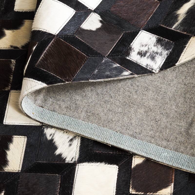 SAFAVIEH Handmade Studio Leather Manti Modern Rustic Glam Rug