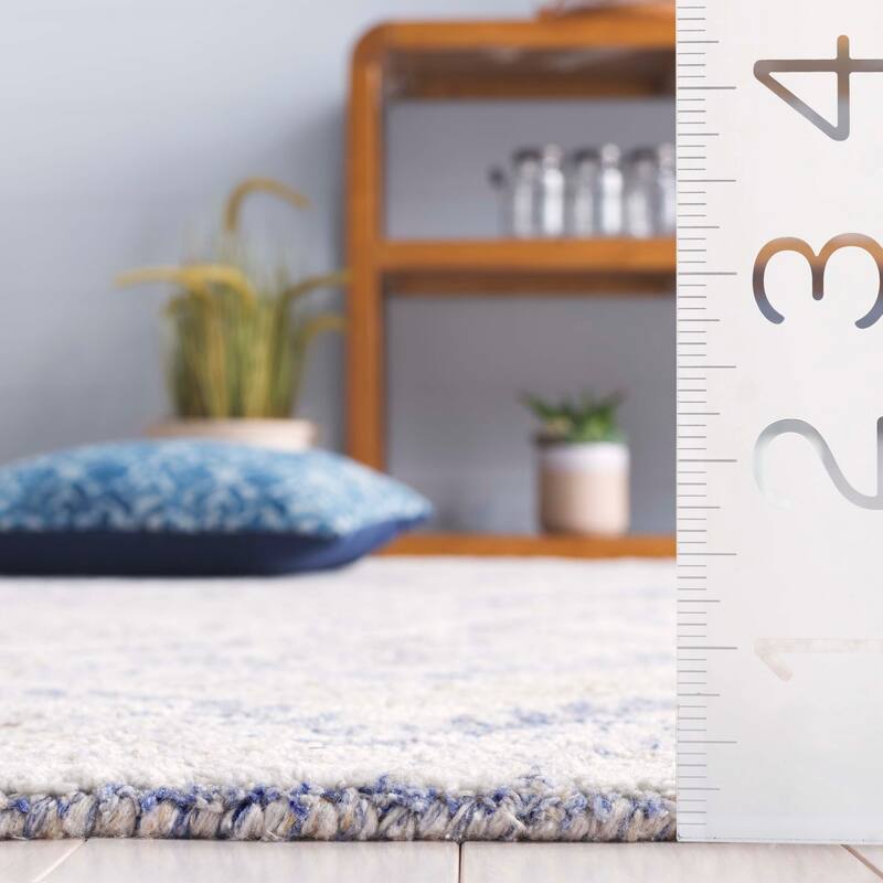 SAFAVIEH Handmade Renewal Saviana Rug