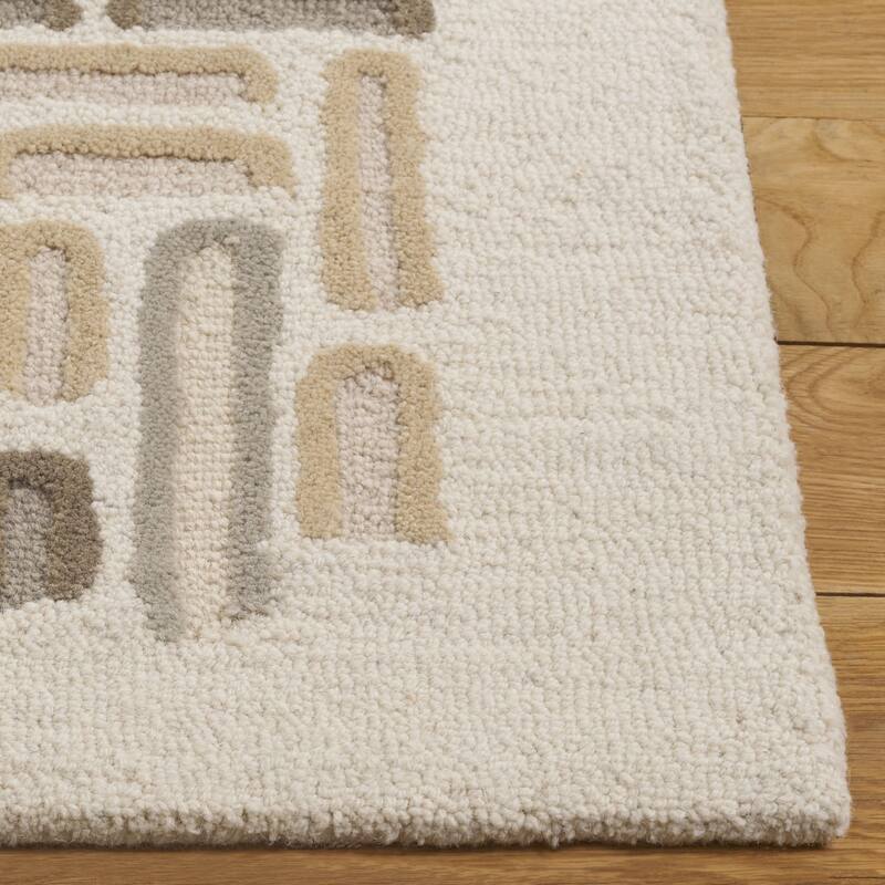 SAFAVIEH Handmade Ebony Kiyuko Wool Rug