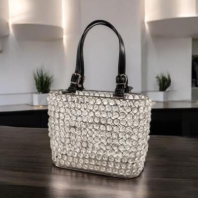 HomeRoots 11" Clear And Silver Faux Crystal And Metal Handbag Shaped Magazine Holder