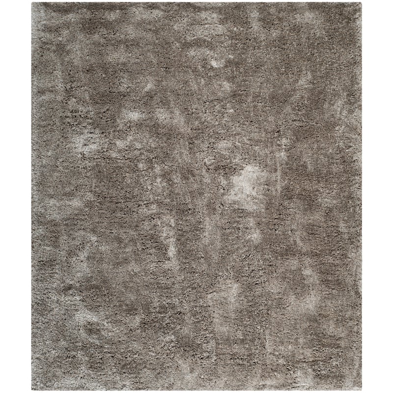 SAFAVIEH Handmade South Beach Leonella Shag Solid Polyester Rug