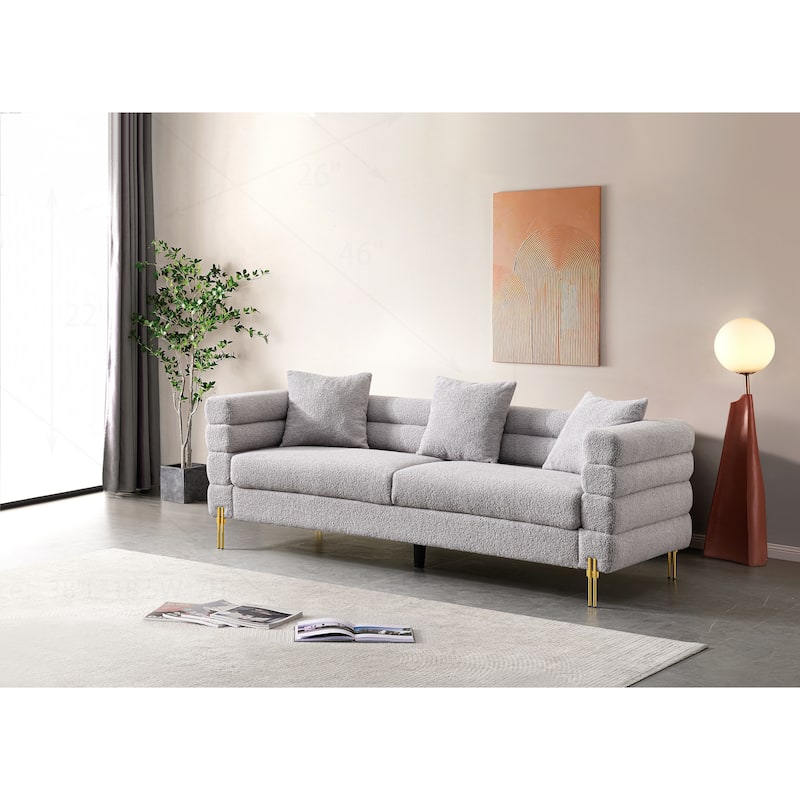 Comfortable Upholstered Sofa with Stylish Golden Legs and Soft Pillows for Living Room