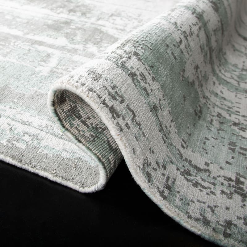 SAFAVIEH Handmade Mirage Ytje Modern Abstract Viscose Rug