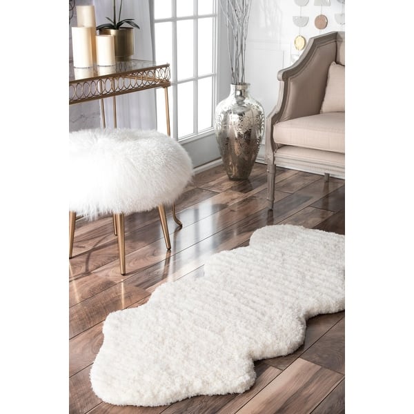 slide 2 of 11, Nuloom Handmade Faux Sheepskin Shag Rug - 2' x 4'5" 2' x 4'5" - Natural - Hide-Shaped