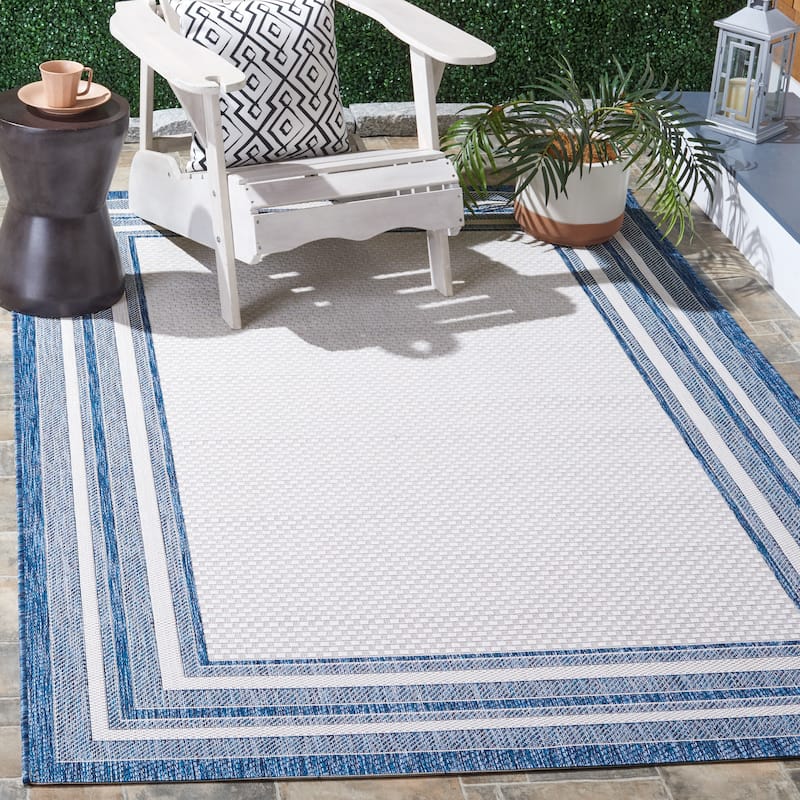 SAFAVIEH Courtyard Vickie Indoor/ Outdoor Waterproof Patio Backyard Rug - 6'7" x 9'6" - Ivory/Navy