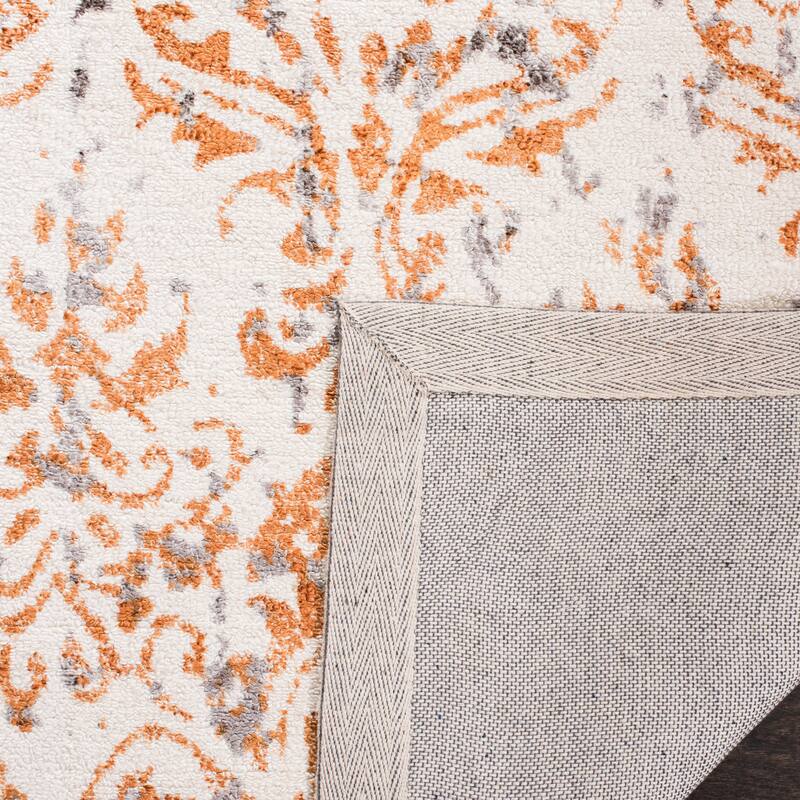 SAFAVIEH Hand-knotted Expression Dagrund Vintage Abstract Viscose Rug