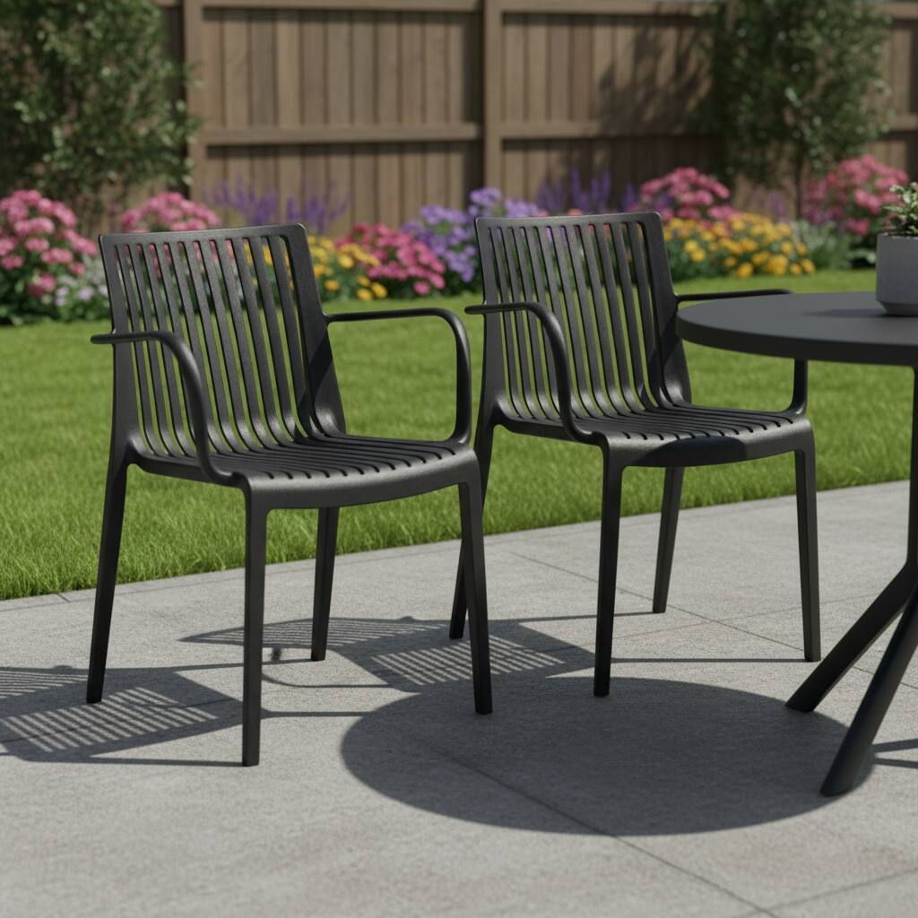 HomeRoots Set of Two Black Heavy Duty Plastic Outdoor Stacking Arm Chairs