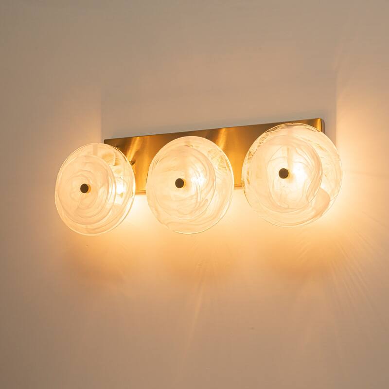3-Light Mid-Century Modern Brushed Brass Vanity Light with Cloud-Textured Round Glass glass disc