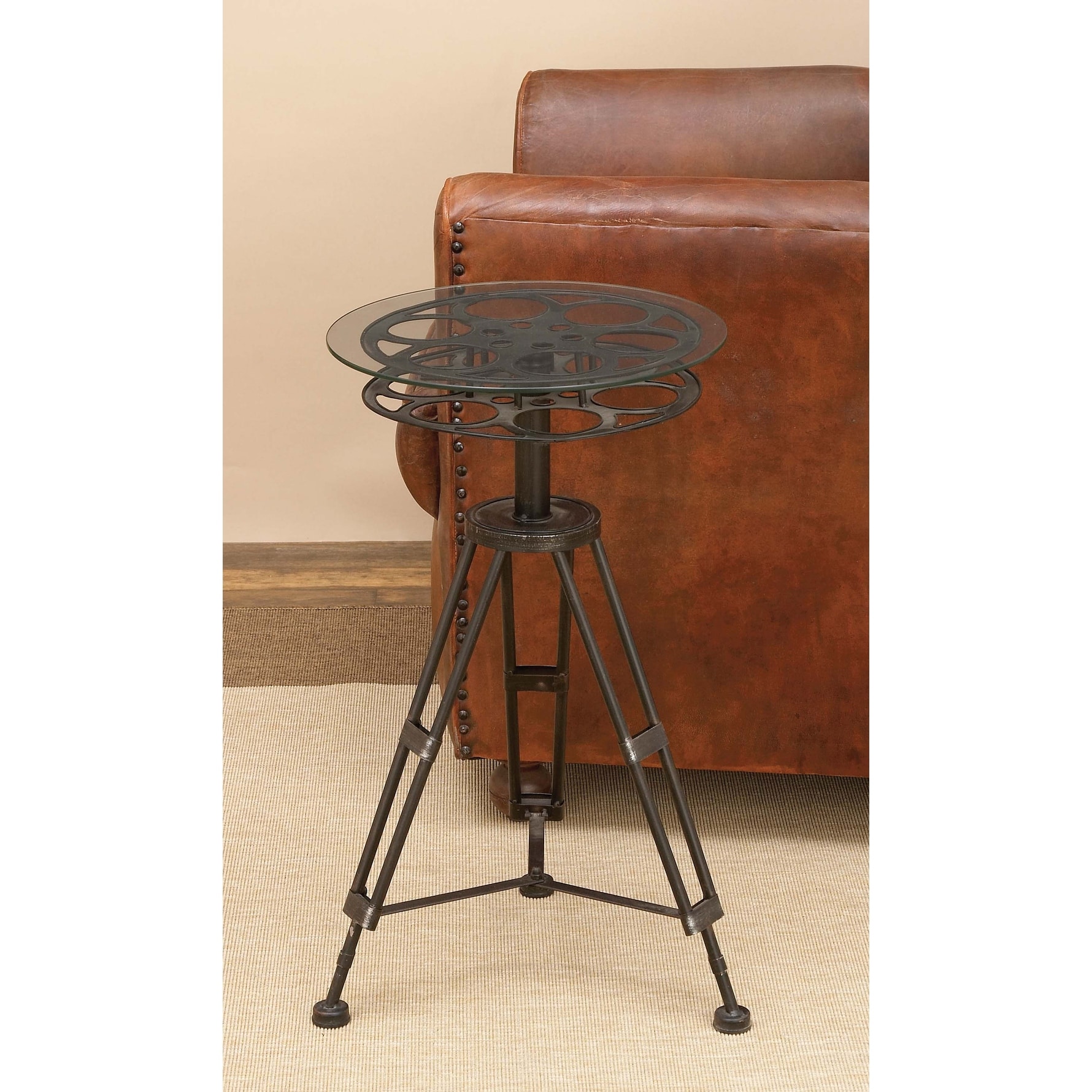 Black Metal Film Reel Accent Table with Tripod Legs and Glass Top
