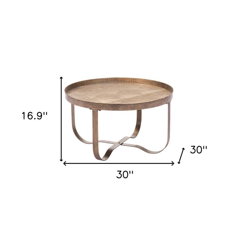HomeRoots 30" Brass Steel Faux Croc Cross Legs Round Tray Style Coffee Table - 30.00 in. x 16.90 in. x 30.00 in.