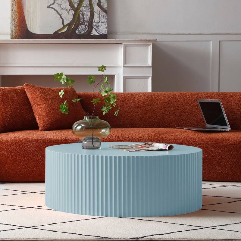 Contemporary Round Coffee Table With Handcrafted Relief
