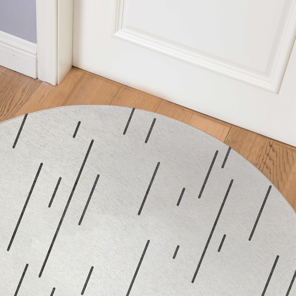 https://ak1.ostkcdn.com/images/products/is/images/direct/4361961f4c7d3fd11e53a34b8043b6e1bb8eca4e/DOWNPOUR-IVORY-Indoor-Floor-Mat-By-Kavka-Designs.jpg