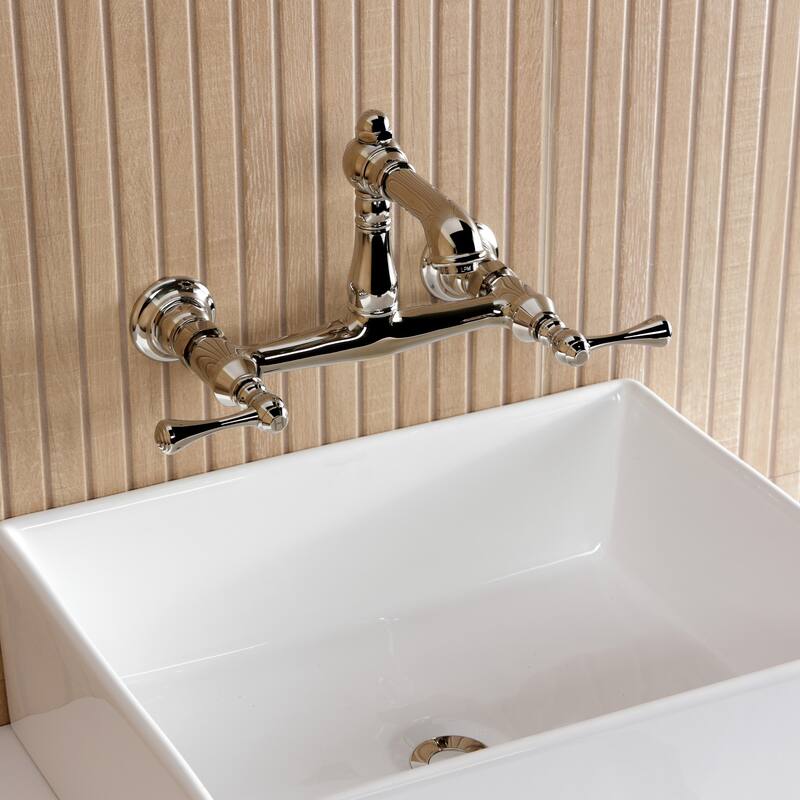 Kingston Brass English Country Two-Handle 2-Hole Wall Mount Bathroom Faucet