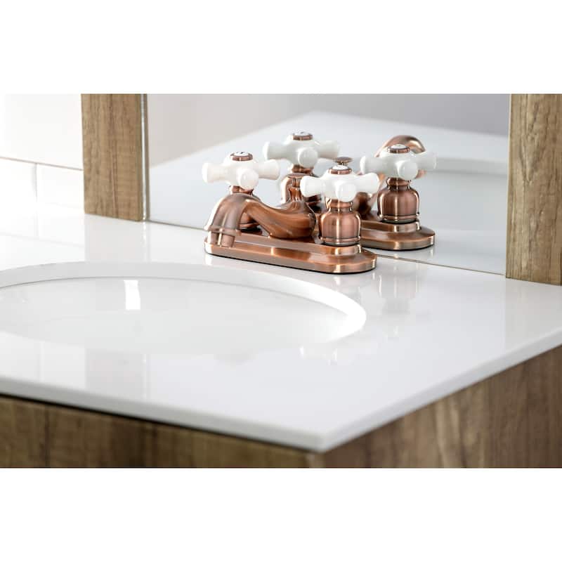 Kingston Brass Restoration Two-Handle 3-Hole Deck Mount 4 in. Centerset Bathroom Faucet