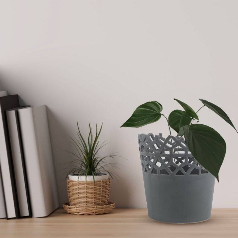 Matte Gray Ceramic Planter Pot with Artistic Cutouts